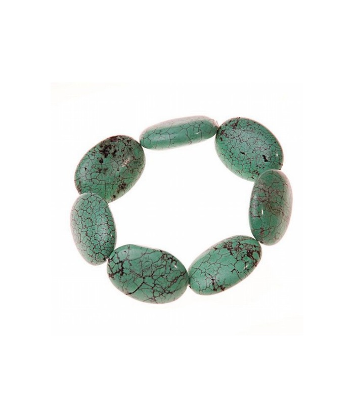 Pulsera de Turquesa (imitación). 7 piezas Ovales de 20x15x5 mm.
Engarce de goma elástica.