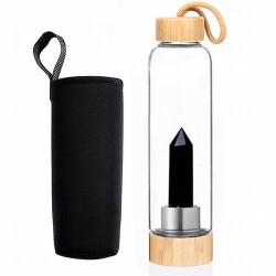 Botella de vidrio con una punta de Obsidiana Negra en su interior bien sujeta a la base.

Tapón de rosca de madera con un eng