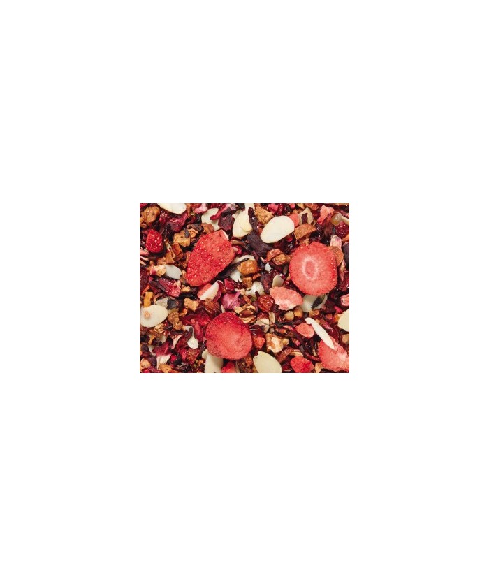trozos de manzana, flor de hibisco, cáscara de escaramujo, cubitos de piña (piña, azúcar), trocitos de almendras, pedacitos cro