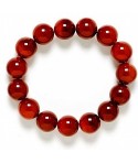 Pulsera de bolas de Carneola pulida de 6 mm.
Engarce de goma el&aacute;stica.