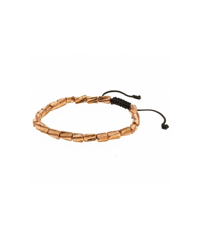 Las cuentas de esta pulsera están hechas a mano. Para los tibetanos las pulseras metálicas son joyas medicinales. Se les otorga