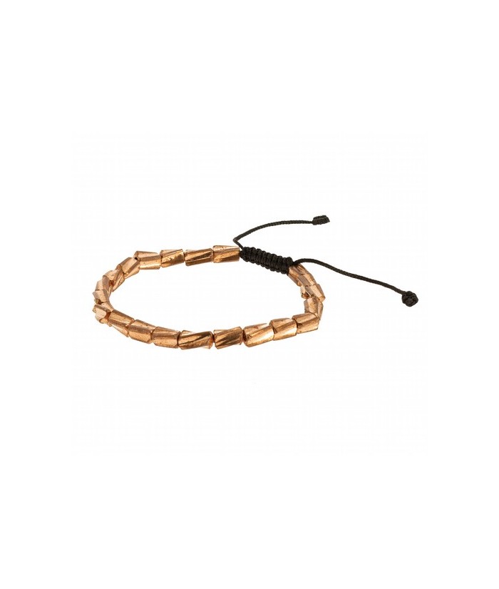 Las cuentas de esta pulsera están hechas a mano. Para los tibetanos las pulseras metálicas son joyas medicinales. Se les otorga