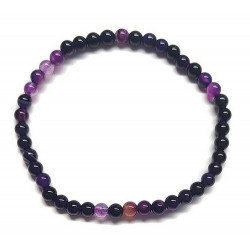 Pulsera elástica muy fina compuesta de cuentas de ágata de 4 mm de diámetro.

Presentado en una lámina de cartón que muestra 