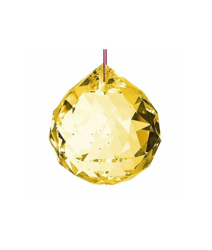 Bola facetada de cristal AMBAR de 50 mm. de diametro.
Engarzada en hilo rojo.

En el feng Shui, las bolas de cristal se util