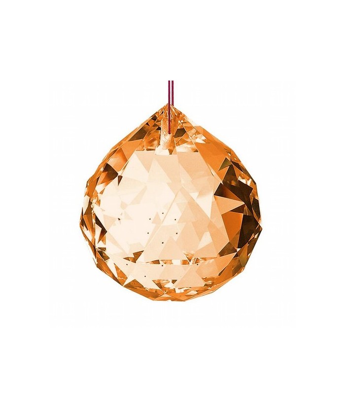 Bola facetada en cristal AMBAR de 40 mm. de diametro.
Engarzada en hilo rojo.

En el feng Shui, las bolas de cristal se util