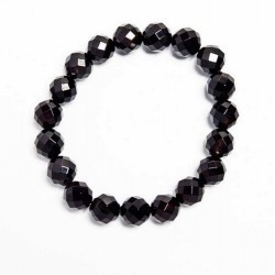 Pulsera de Ágata Negra con bola de 10mm facetada.

En goma elástica.