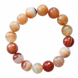 Pulsera de Ágata bandeada. Pulsera facetada en bolas de 12mm.
En goma elástica.