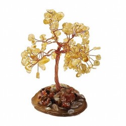 Árbol compuesto de 110 piedras chip (aprox.) de Citrino (de 0,5 a 1 cm).

Base de chapa de Ágata con piedrecitas chip variada