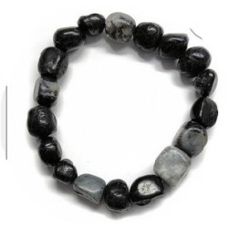 Pulsera de Turmalina en forma de rodado engarzado con silicona elástica.

Medida mineral: 1 x 0.5 cm
