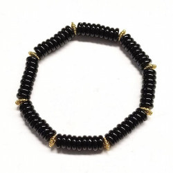 Pulsera de Ónix Negro en aros de 6mm aprox.

En goma elástica.

Peso: 40 gramos approx.