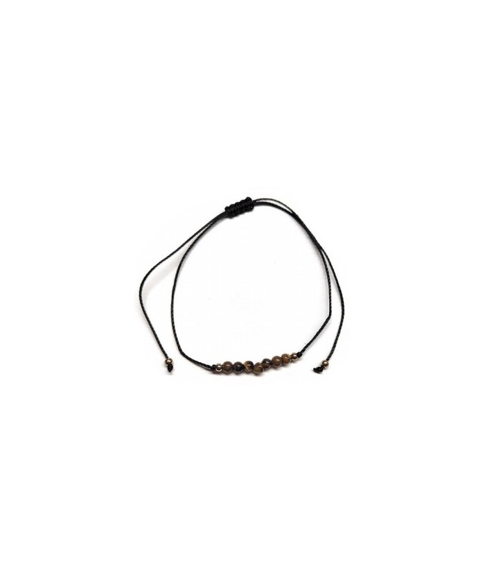 Pulsera de bolas de Ojo de Tigre de 4mm en hilo negro ajustable.

Tarjeta exclusiva en 3 idiomas.