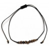 Pulsera de bolas de Ojo de Tigre de 4mm en hilo negro ajustable.

Tarjeta exclusiva en 3 idiomas.