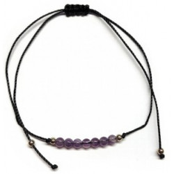 Pulsera de bolas de Amatista de 4mm en hilo negro ajustable.

Tarjeta exclusiva en 3 idiomas.