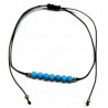 Pulsera de bolas de Turquenita de 4mm en hilo negro ajustable.

Tarjeta exclusiva en 3 idiomas.