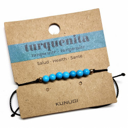 Pulsera de bolas de Turquenita de 4mm en hilo negro ajustable.

Tarjeta exclusiva en 3 idiomas.