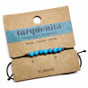 Pulsera de bolas de Turquenita de 4mm en hilo negro ajustable.

Tarjeta exclusiva en 3 idiomas.