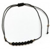 Pulsera de bolas de Onix de 4mm en hilo negro ajustable.

Tarjeta exclusiva en 3 idiomas.