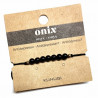 Pulsera de bolas de Onix de 4mm en hilo negro ajustable.

Tarjeta exclusiva en 3 idiomas.