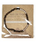 Pulsera de Ojo de Tigre y Cristal de Roca en bolas de 4mm.

En goma el&aacute;stica.

Tarjeta exclusiva en 3 idiomas.