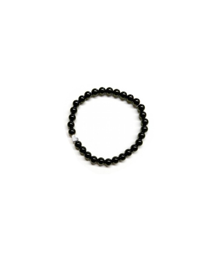 Pulsera de Ónix( bolas de 6mm) con símbolo de corazón plateado.

En goma elástica.

Tarjeta exclusiva en 3 idiomas.