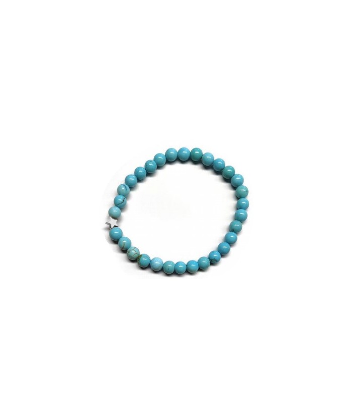 Pulsera de Turquenita (bolas de 6mm) con símbolo de estrella plateada.

En goma elástica.