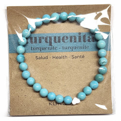 Pulsera de Turquenita (bolas de 6mm) con símbolo de corazón plateado.

En goma elástica.

Tarjeta exclusiva en 3 idiomas