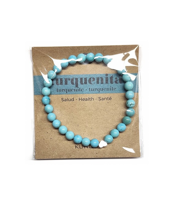Pulsera de Turquenita (bolas de 6mm) con símbolo de corazón plateado.

En goma elástica.

Tarjeta exclusiva en 3 idiomas