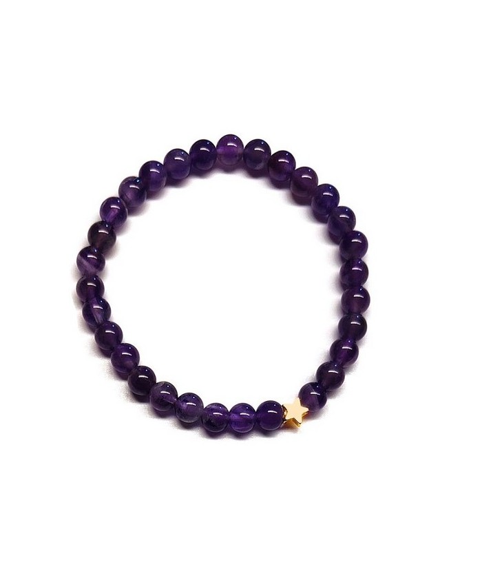 Pulsera de Amatista (bolas de 6mm) con símbolo de estrella dorada.

En goma elástica.

Tarjeta exclusiva en 3 idiomas.