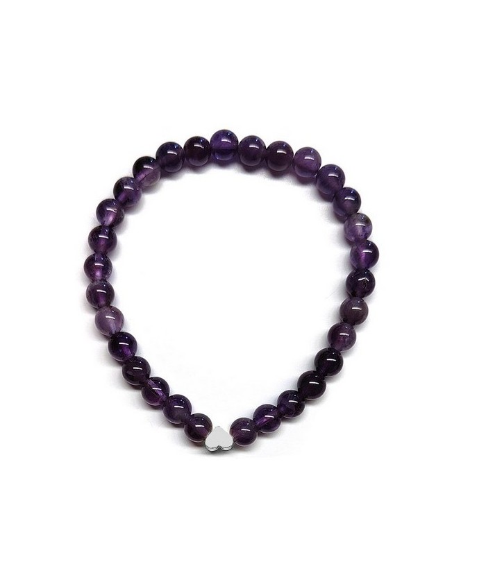 Pulsera de Amatista (bolas de 6mm) con símbolo de corazón plateado.

En goma elástica.

Tarjeta exclusiva en 3 idiomas.