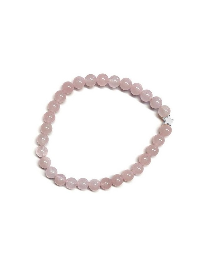 Pulsera de Cuarzo Rosa (bolas de 6mm) con símbolo de estrella plateada.

En goma elástica.

Tarjeta exclusiva en 3 idiomas.