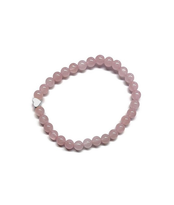 Pulsera de Cuarzo Rosa (bolas de 6mm) con símbolo de corazón plateado.

En goma elástica.

Tarjeta exclusiva en 3 idiomas.