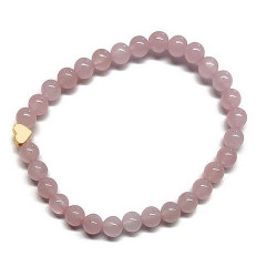 Pulsera de Cuarzo Rosa (bolas de 6mm) con símbolo de corazón dorado.

En goma elástica.

Tarjeta exclusiva en 3 idiomas.