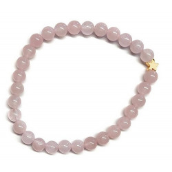 Pulsera de Cuarzo Rosa (bolas de 6mm) con símbolo de estrella dorada.

En goma elástica.

Tarjeta exclusiva en 3 idiomas.