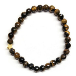 Pulsera de Ojo de Tigre (bolas de 6mm) con símbolo de estrella dorada.

En goma elástica.

Tarjeta exclusiva en 3 idiomas.