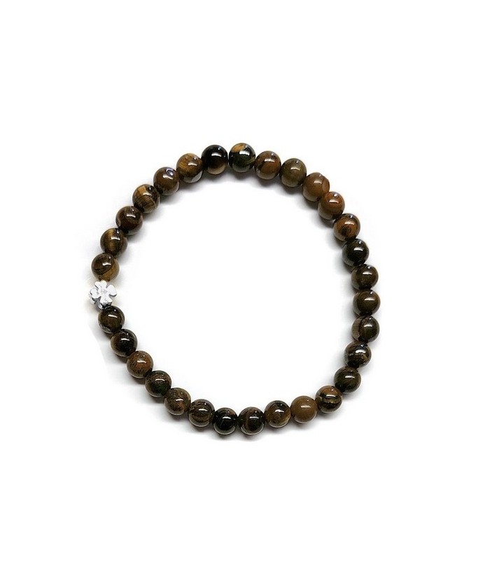 Pulsera de Ojo de Tigre (bolas de 6mm) con símbolo de trébol plateado.

En goma elástica.

Tarjeta exclusiva en 3 idiomas.