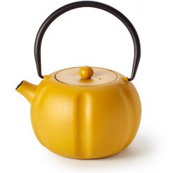 Su forma redonda y su color amarillo mostaza le dan a esta hermosa tetera de hierro un aspecto inusual que, con un poco de imag