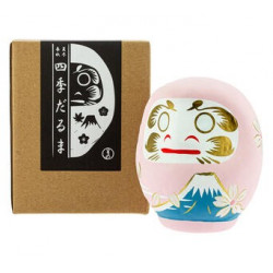 Para los japoneses, tanto daruma como el monte Fuji son símbolos espirituales, budista uno y sintoísta el otro. En esta figurit