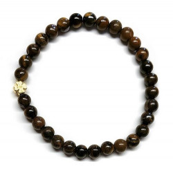 Pulsera de Ojo de Tigre (bolas de 6mm) con símbolo de trébol dorado.

En goma elástica.