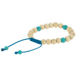 Las pulseras malas de madera, como esta en tonos claros, son accesorios llenos de significado que pueden acompañarte en la medi