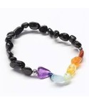 Pulsera de Chakras y Turmalina rodado con grosor 6x9mm.

En goma el&aacute;stica.
